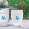 Glass Coffee Cup with a secure pushon Silicon lid and a wide heat resistant silicon band